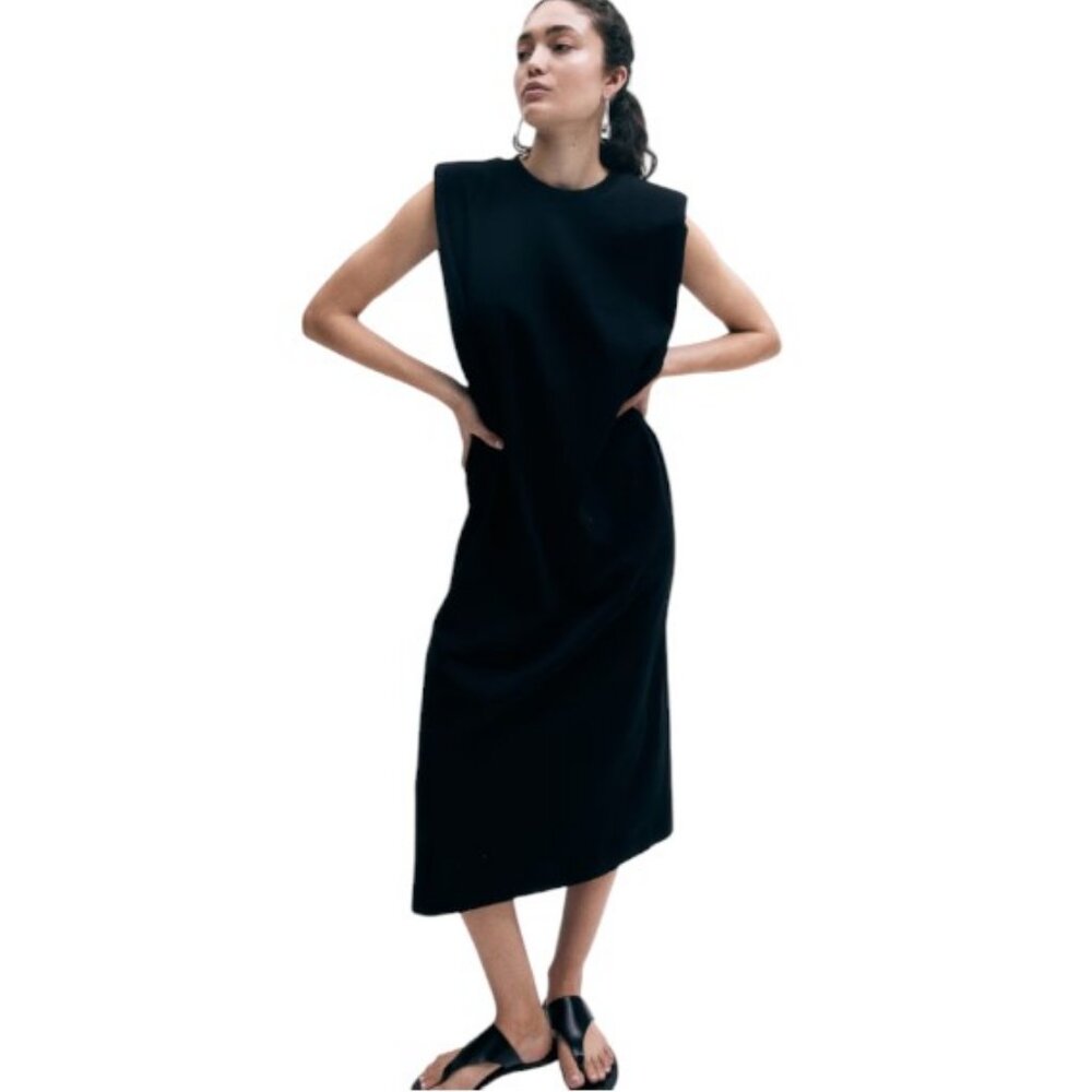 GYK black sleeveles with shoulder pads dress size M